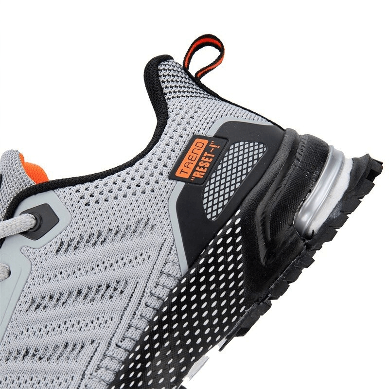 Wear-resistant non-slip women's sports walking shoe with breathable mesh, TPR outsole, and lace-up closure in gray and black.